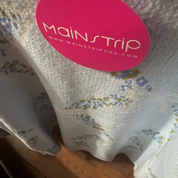 Main Strip Blue and White Textured Knit with bows and flowers 
Brand New - Picture 2 of 2